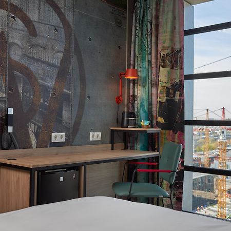Inntel Hotels Amsterdam Landmark Экстерьер фото The interior of the room