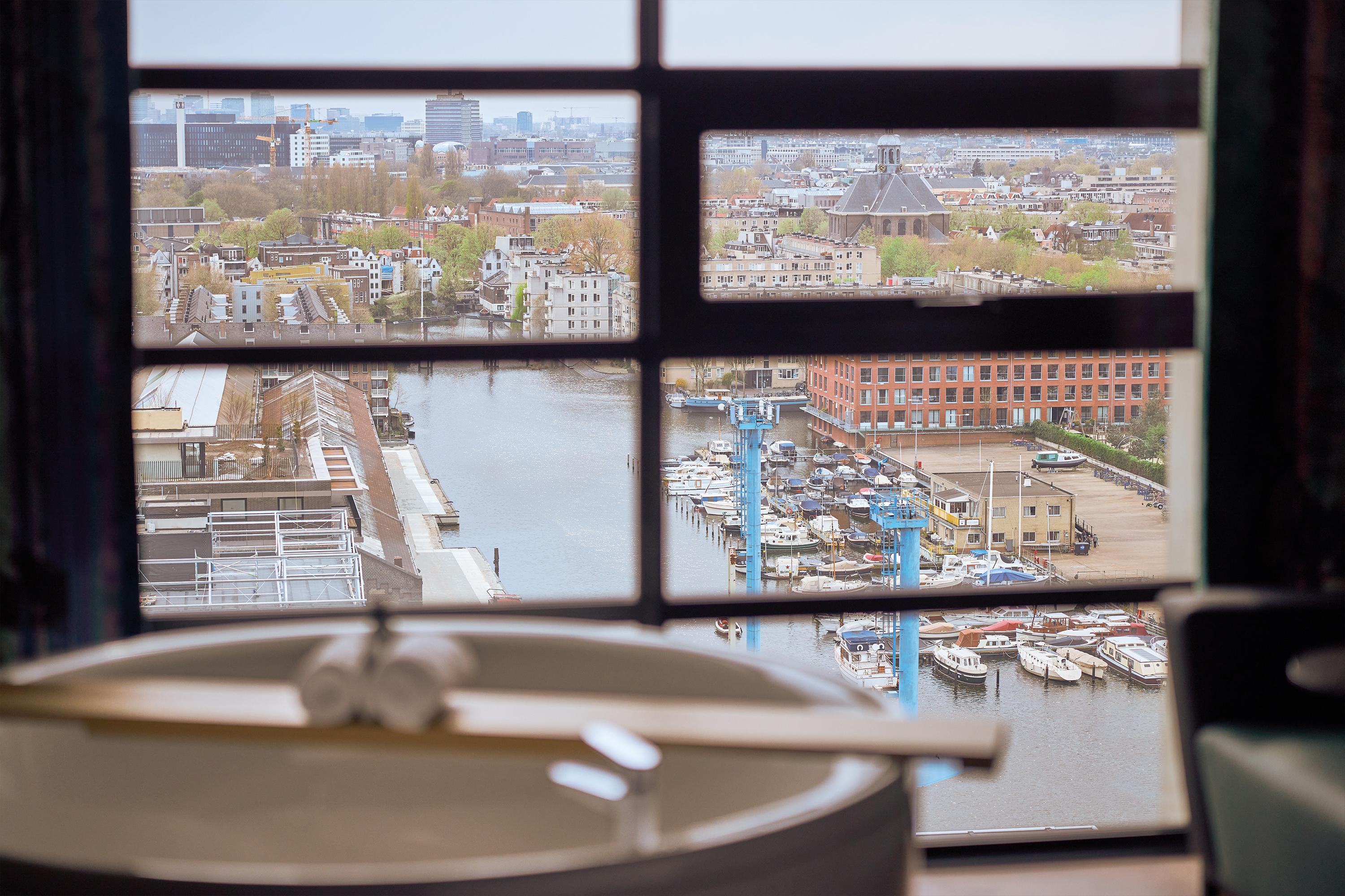 Inntel Hotels Amsterdam Landmark Экстерьер фото View of the city of Rotterdam from the top of the tower